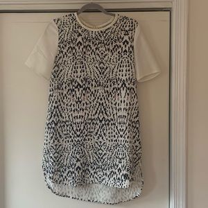 Mini shift dress - lower in the back. Black and pink spots